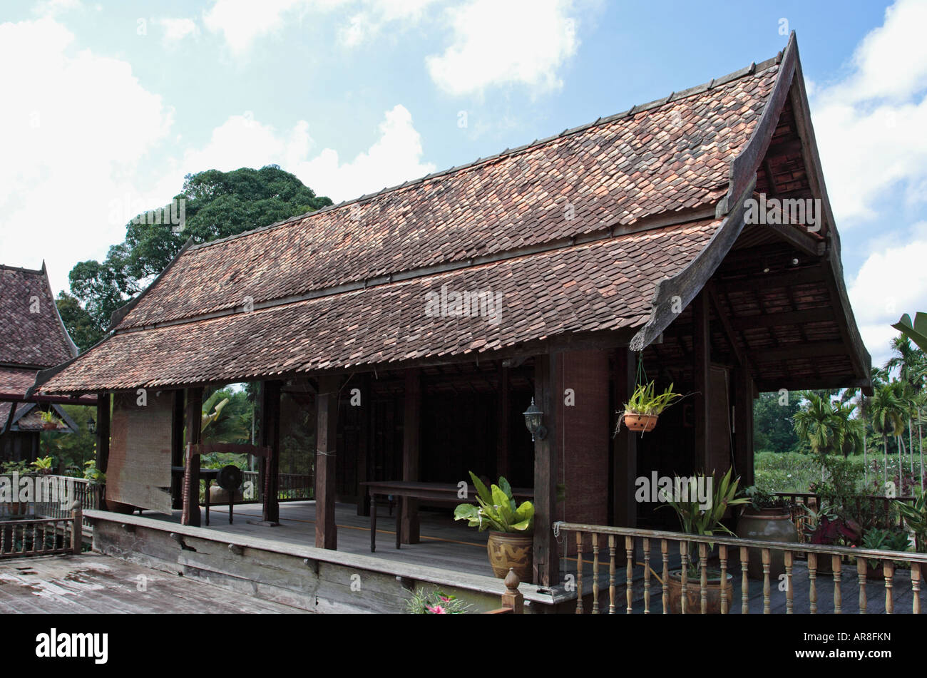 Steep roof slope of a traditional wooden Malay house in Terengganu