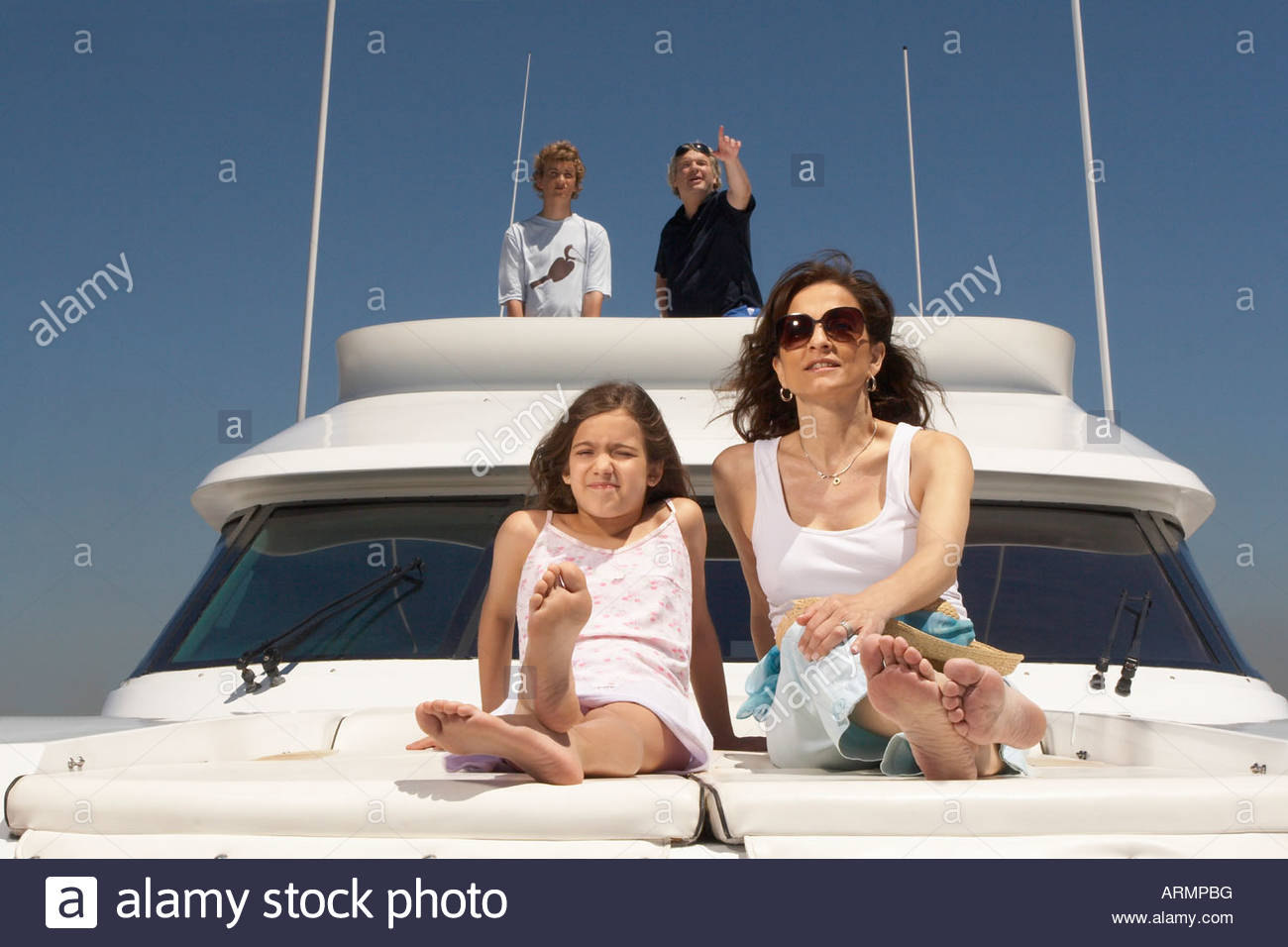 Young family relaxing on boat Stock Photo, Royalty Free Image 16088931 Alamy