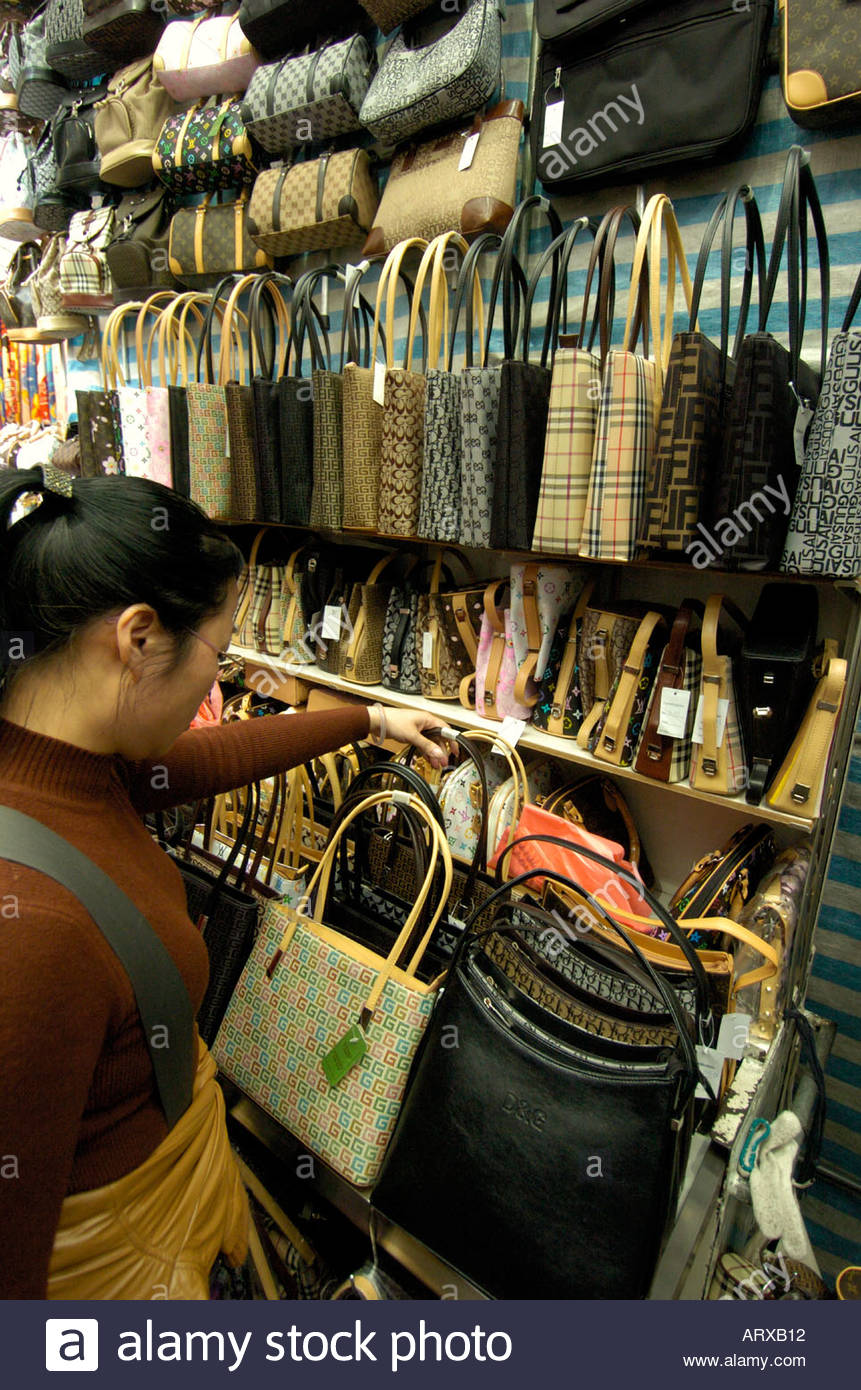 People buying fake designer handbags in Ladies Market Mongkok Kowloon