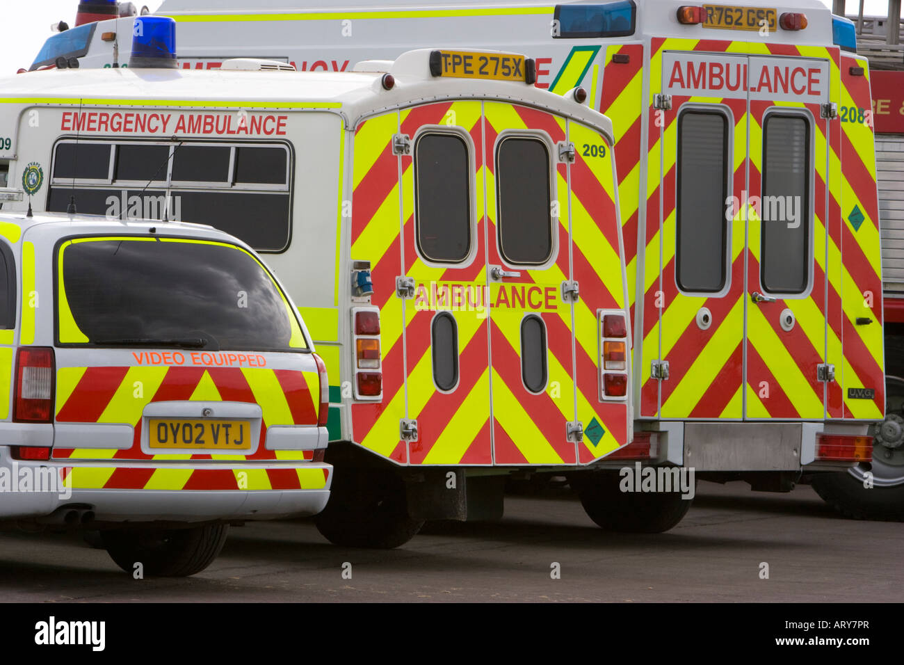 Back end of ambulances showing emergency vehicle striped markings Stock