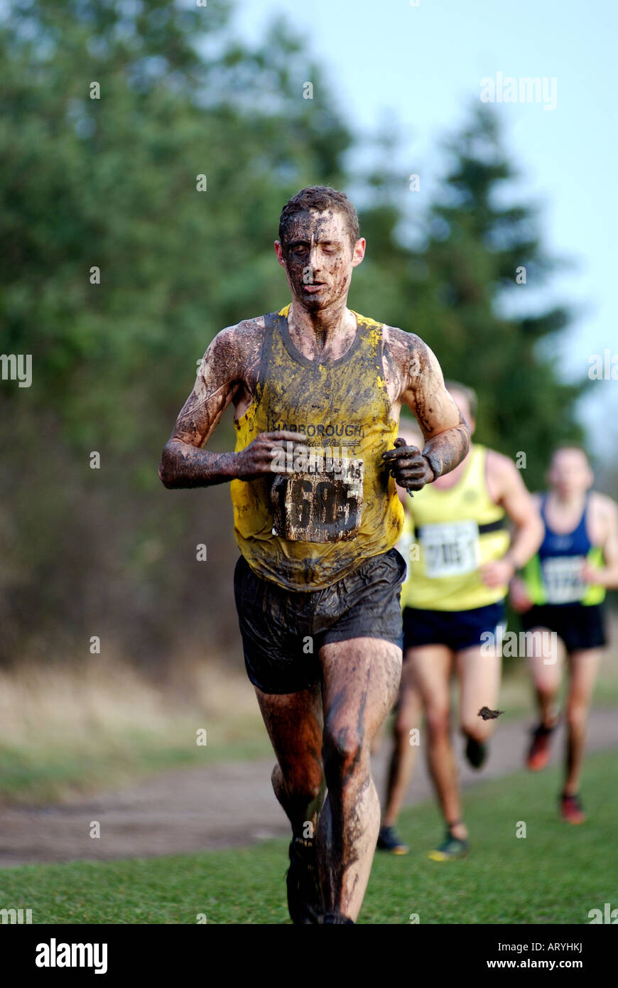Muddy runner in Midland Mens Cross Country Championships Stock Photo