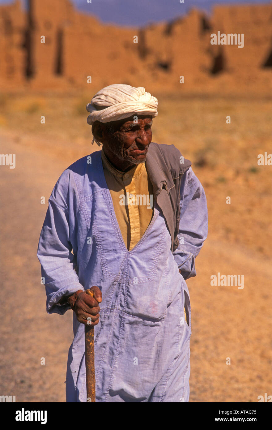 Moroccan People Person Ethnic Berber Man Walking Along Road Between Stock Photo, Royalty Free