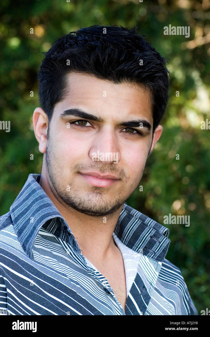 Handsome Teenage Pakistani Man Smiling Stock Photo Royalty Free Image handsome-teenage-pakistani-man-smiling-stock-photo-royalty-free-image