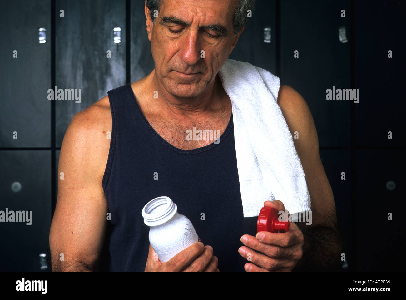 Mature Man Prepares Of His Workout In The Locker Room Stock Photo Alamy