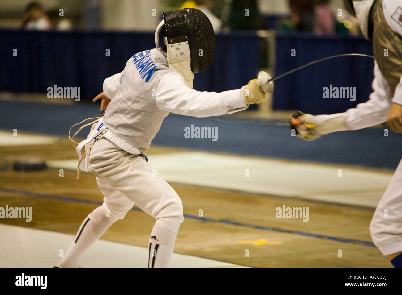 SPORTS Fencing competition bout male foil competitors on strip during