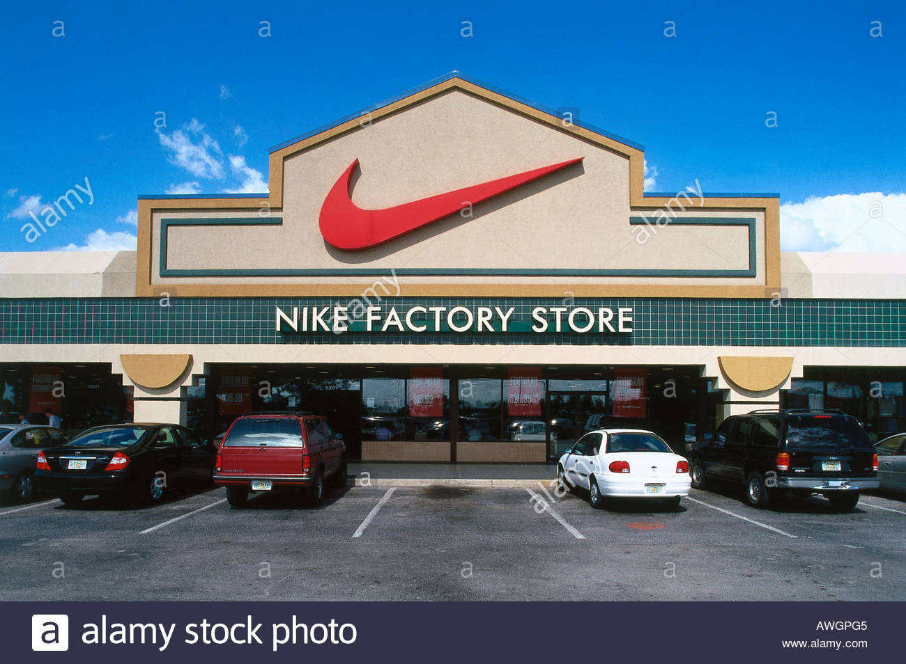 USA, Florida, Orlando, Nike Factory Store, cars in parking bays Stock Photo, Royalty Free Image ...
