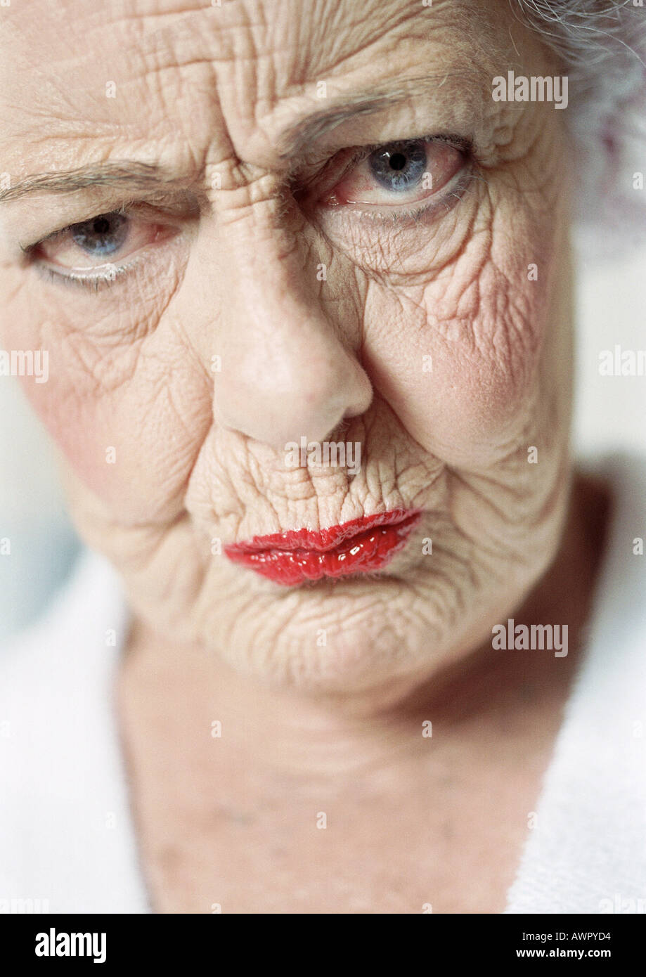 [Image: elderly-woman-frowning-portrait-close-up-AWPYD4.jpg]