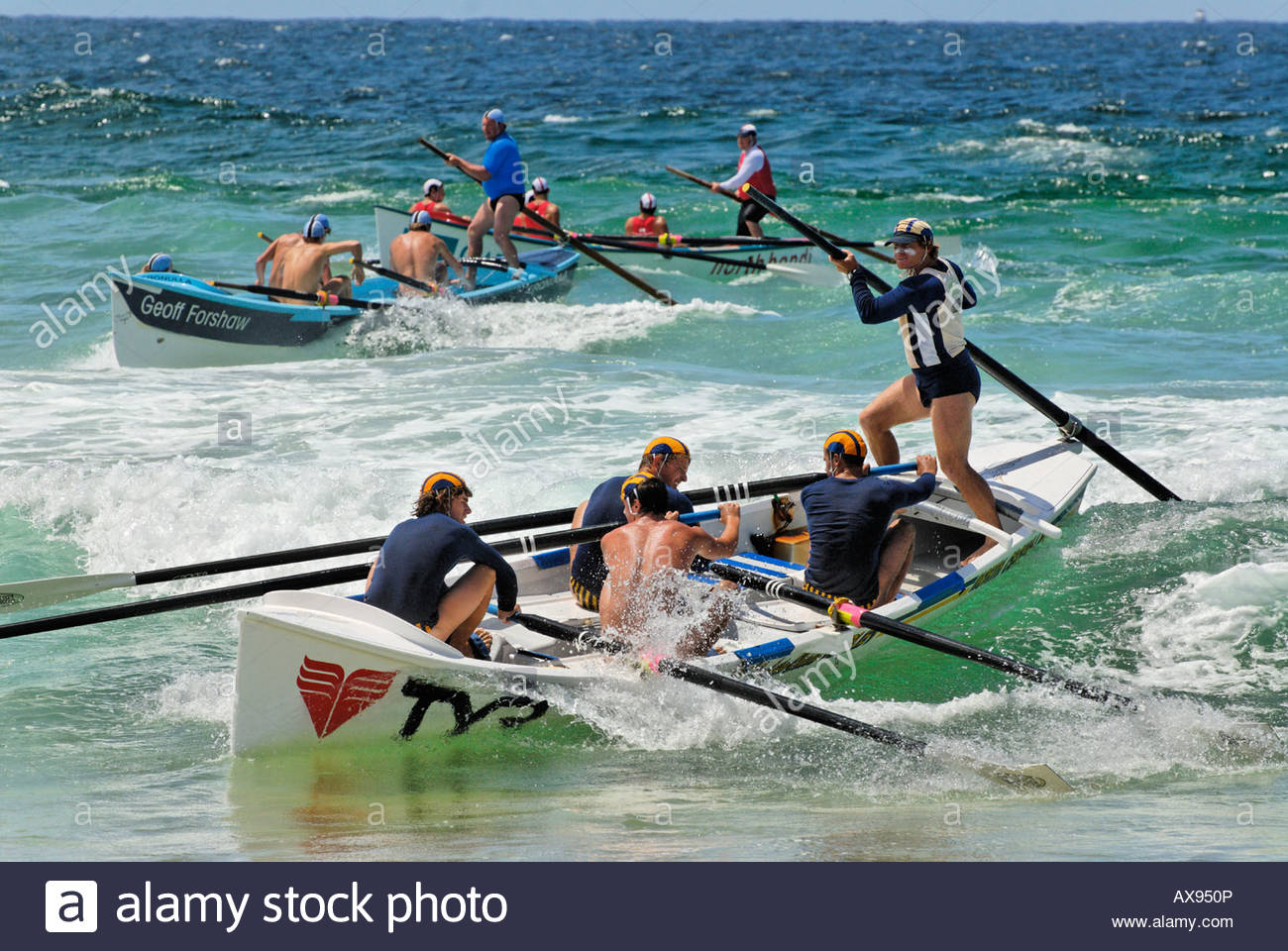 "surf life saving rowing boat on wave at a surf carnival at Maroubra