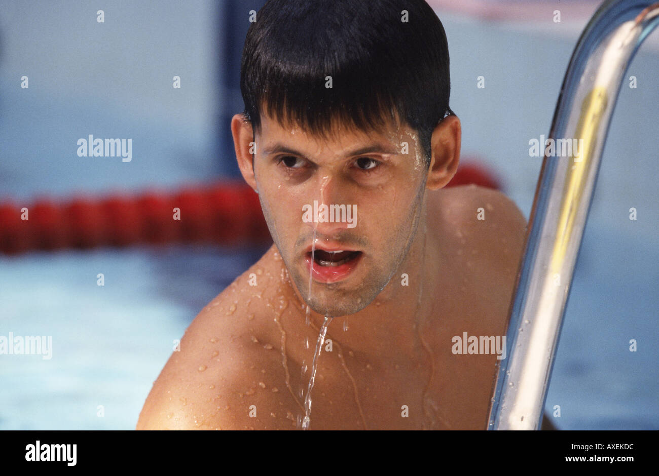 Save preview image - man-male-age-30-35-dark-haired-slim-fit-wet-swim-look-exit-water-indoor-AXEKDC