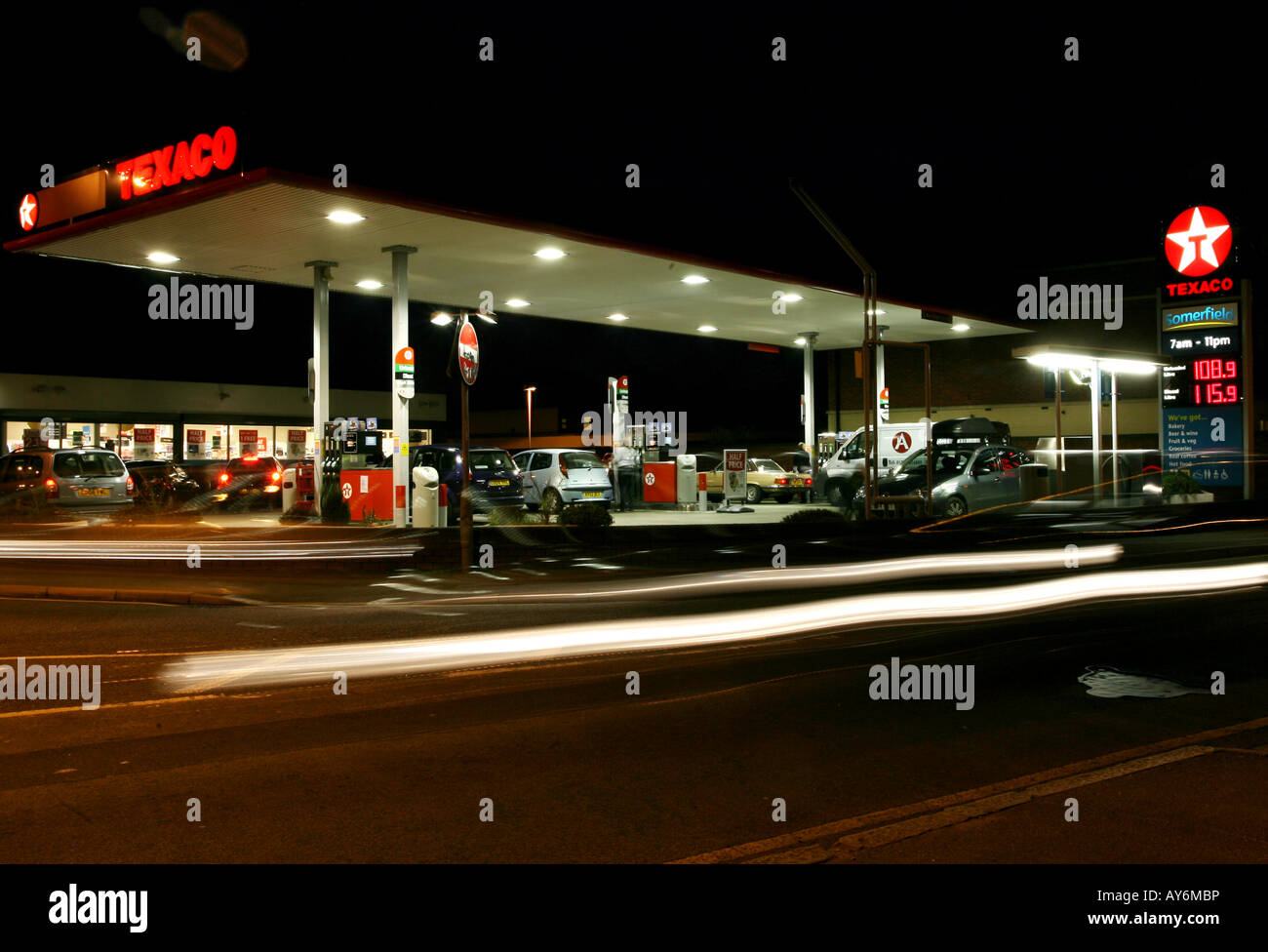 A Texaco petrol service station at night n in Hornchurch Essex Stock