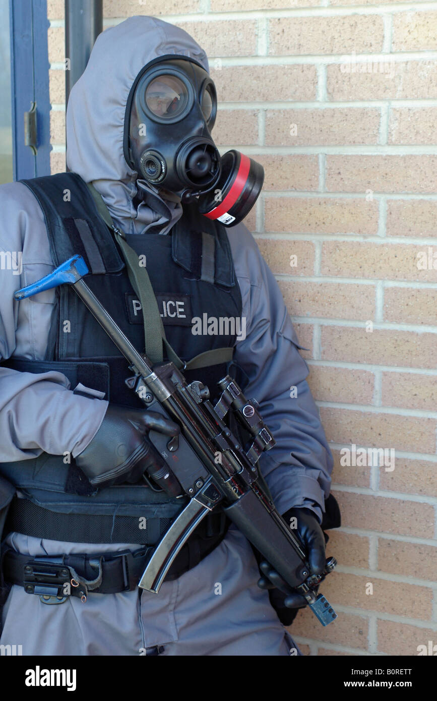 Police firearms officers training in CBRN PPE Stock Photo, Royalty Free