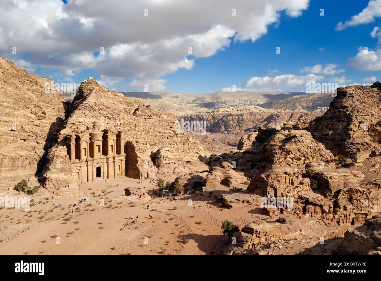 Ornate Carved Rock Tomb Known As The Monastery El Deir Surrounded By