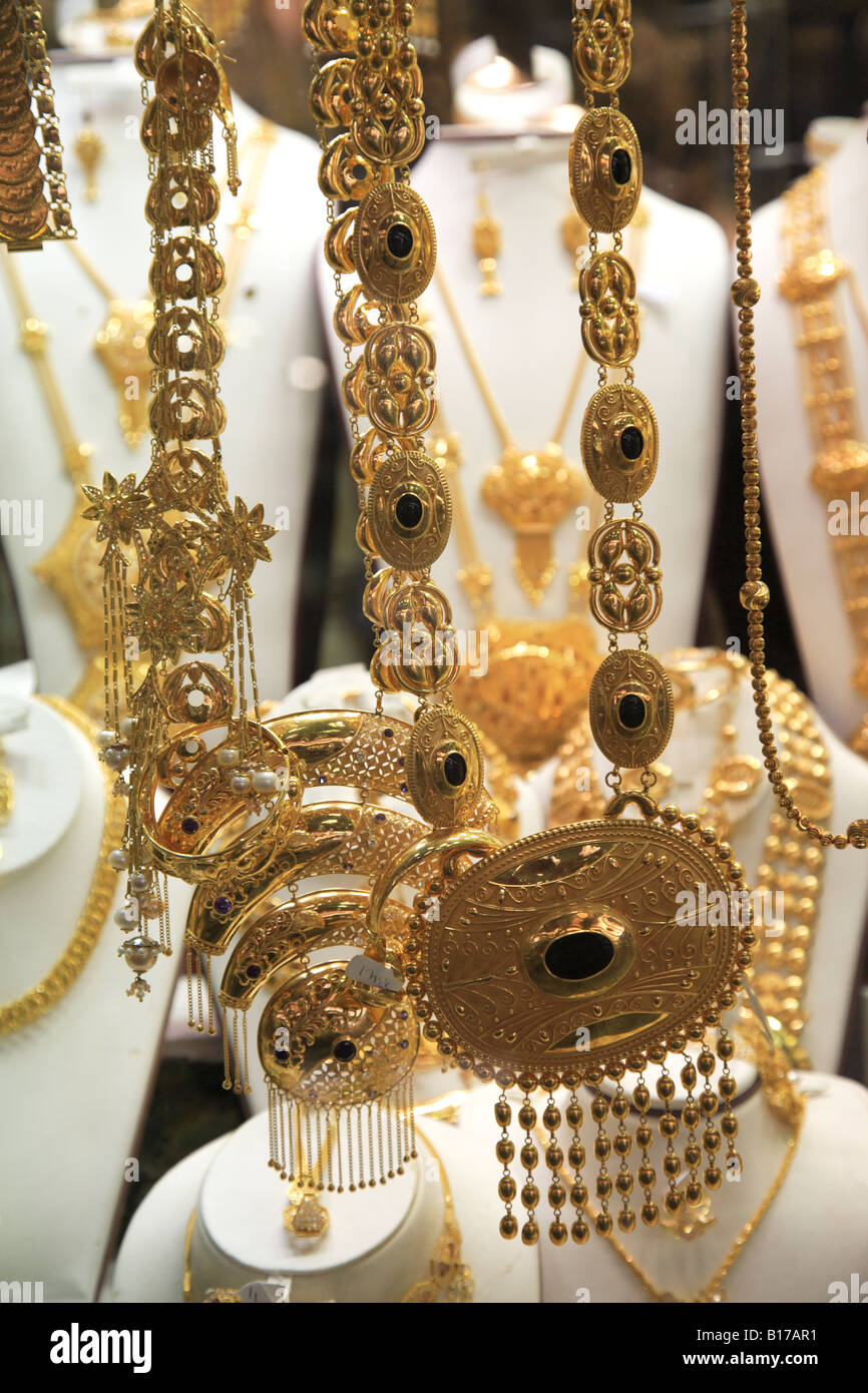 Gold jewelry for sale in the Gold Souk or Market Deira Dubai United Stock Photo, Royalty Free ...