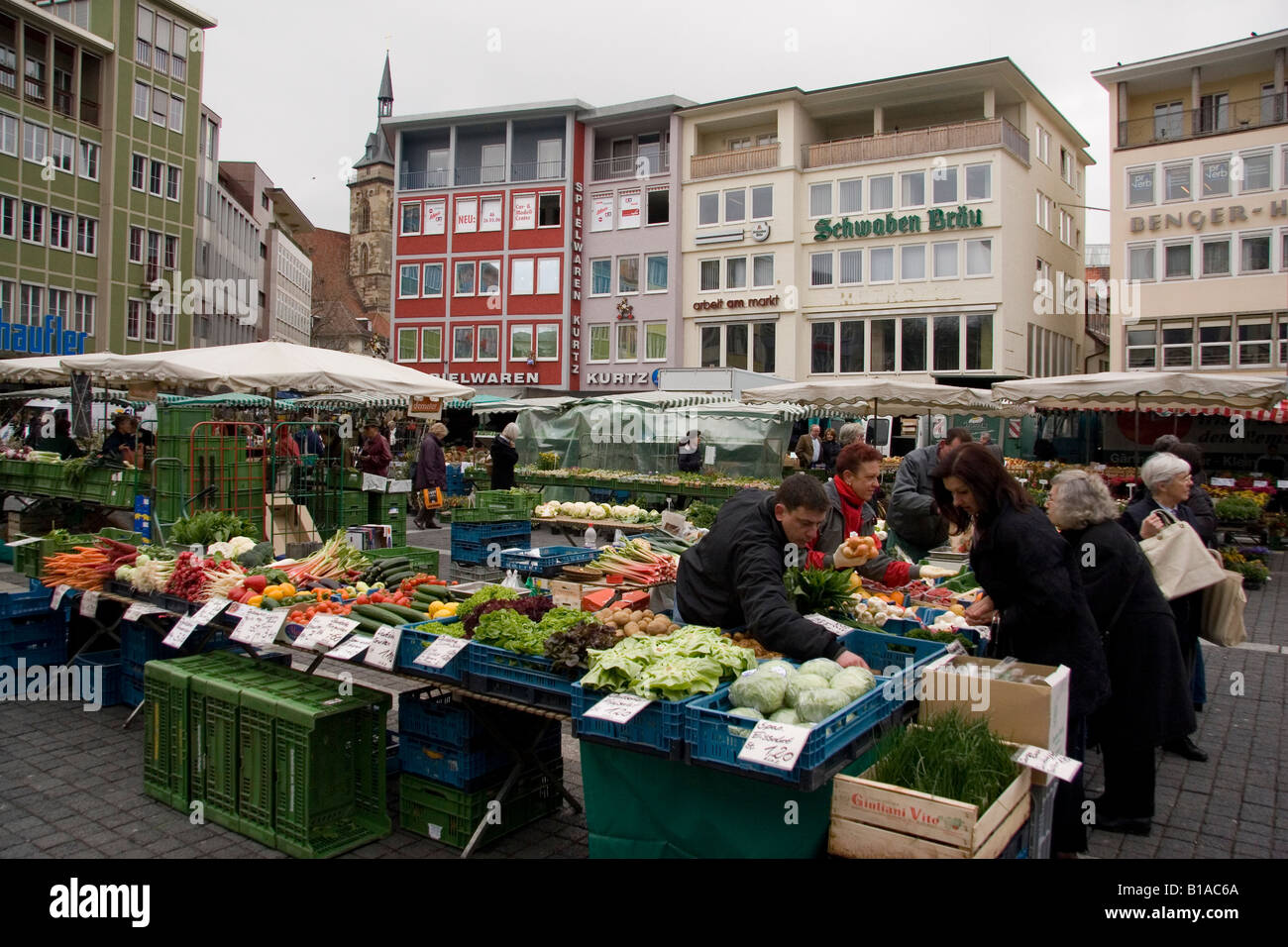 Market day in Stuttgart, Germany. Despite poor weather, flowers are