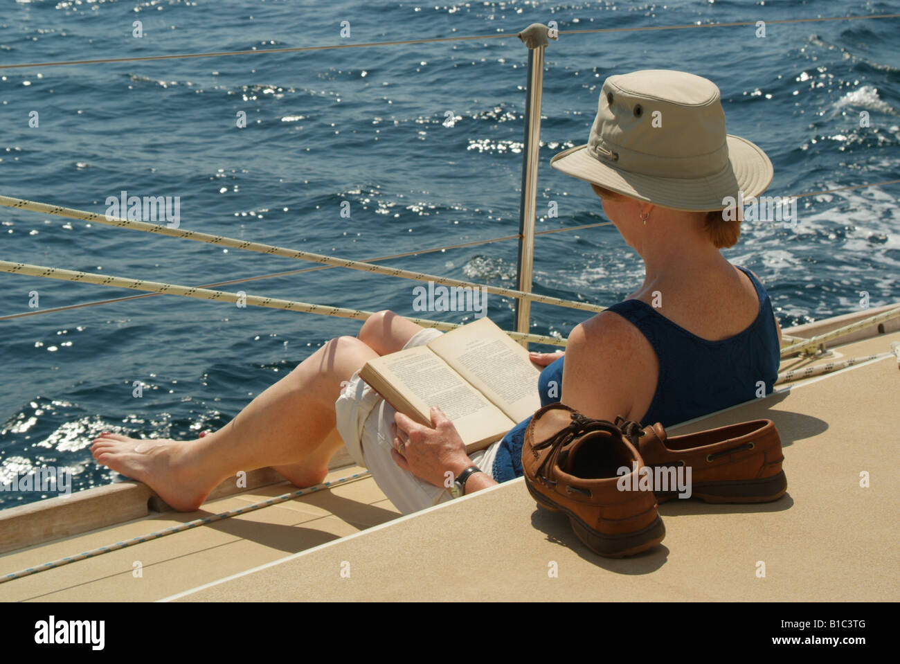 Worksheet Reading Boat woman reading book on boat stock photo royalty free image boat
