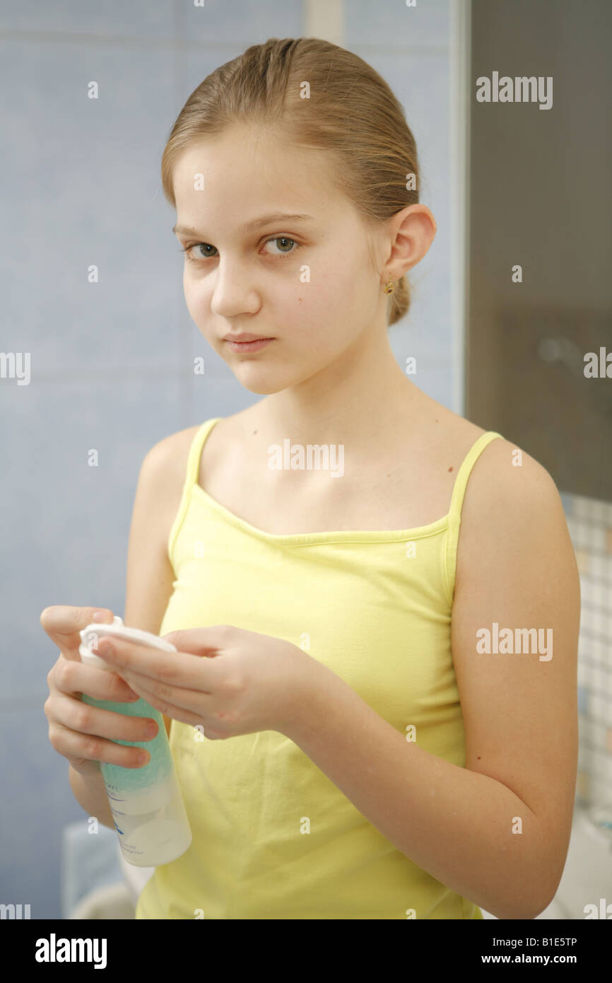 Preteen girl is cleaning face Skincare Stock Photo, Royalty Free Image