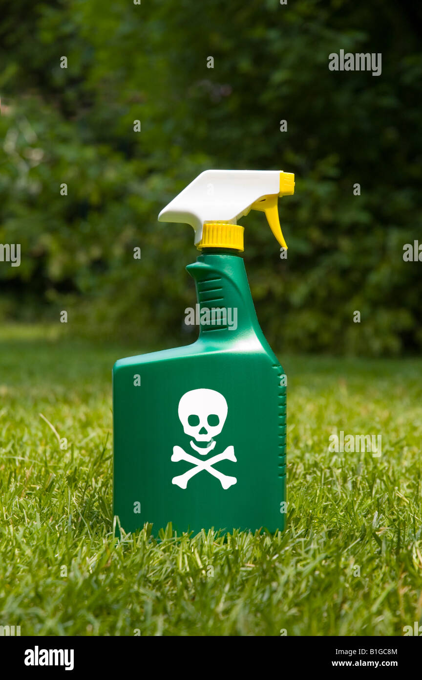 Skull And Cross Bones On A Spray Bottle Of Herbicide Skull And Cross Bones On A Spray Bottle Of Herbicide