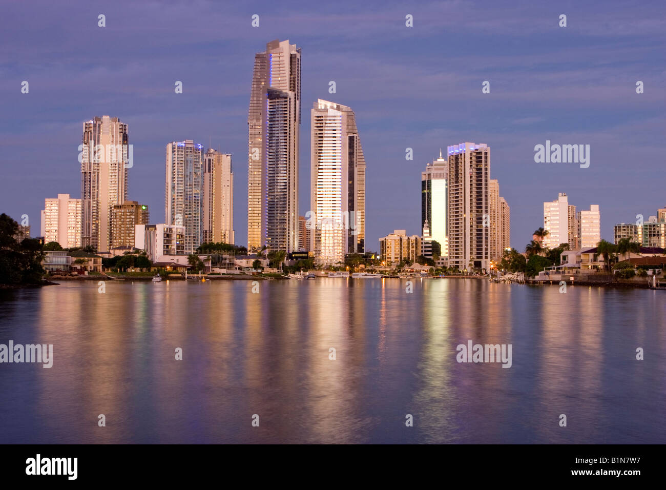 Low Angle View Of Surfers Paradise Skyline At Dusk Across Nerang River