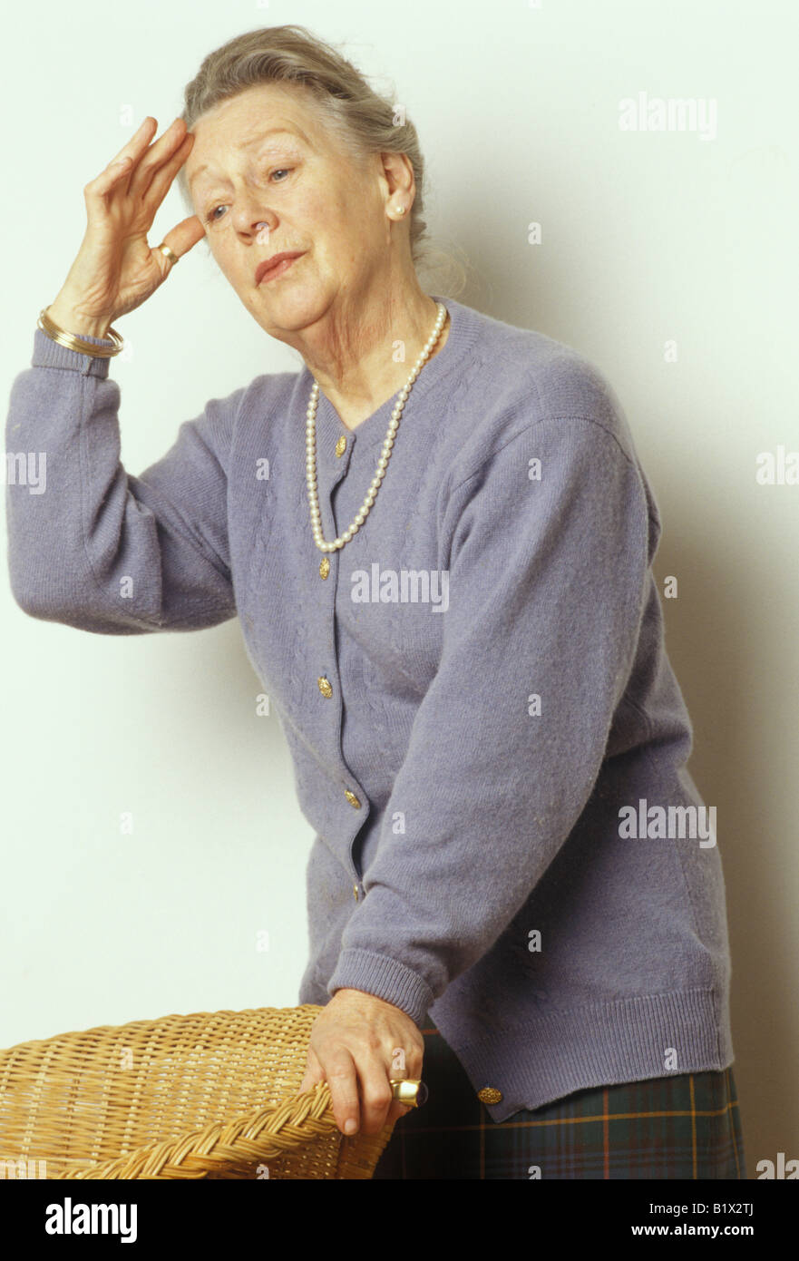 elderly woman feeling dizzy Stock Photo, Royalty Free Image 18398034