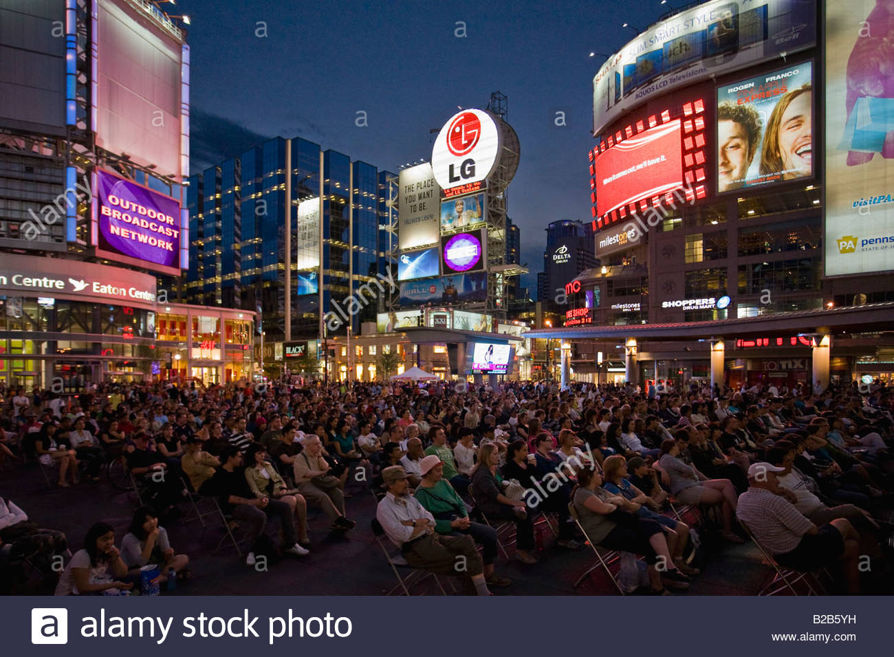 Crowds for outdoor movie night in Younge Dundas Square a public space