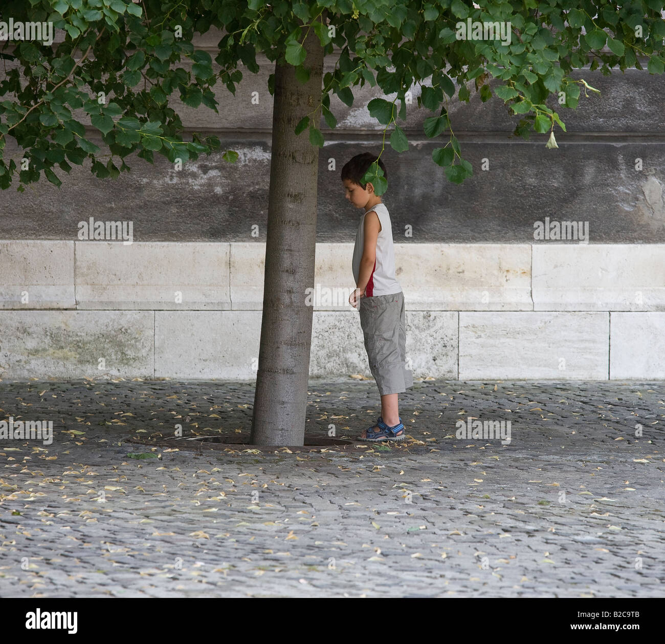 Guy peeing in the woods