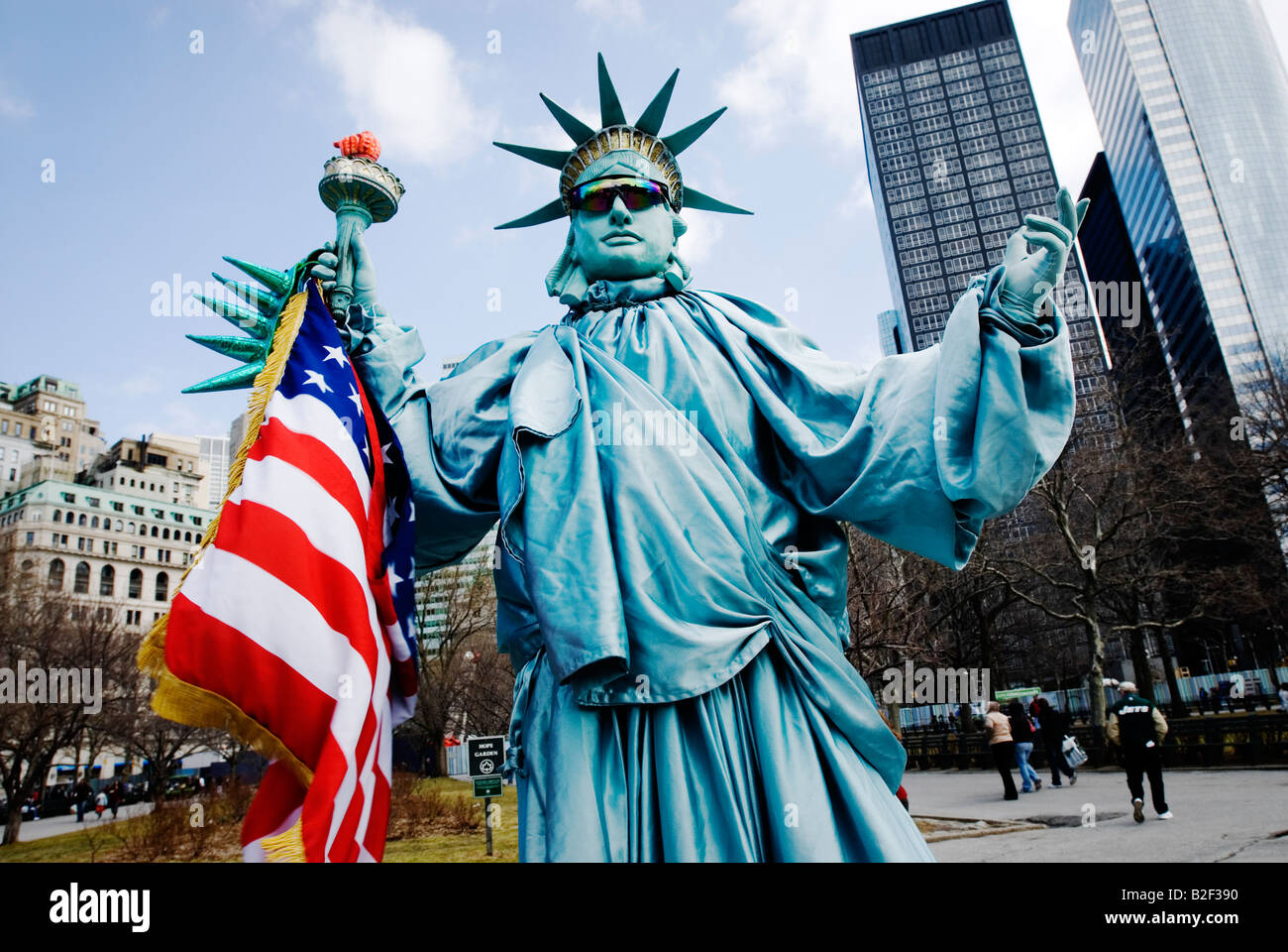 Low angle view of a person in disguise of Statue of Liberty New York Stock Photo, Royalty Free