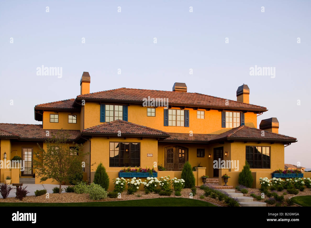 Tuscan Style Home luxury tuscan style home exterior at sunrise located in fort Tuscan Style Home luxury tuscan style home exterior at sunrise located in fort