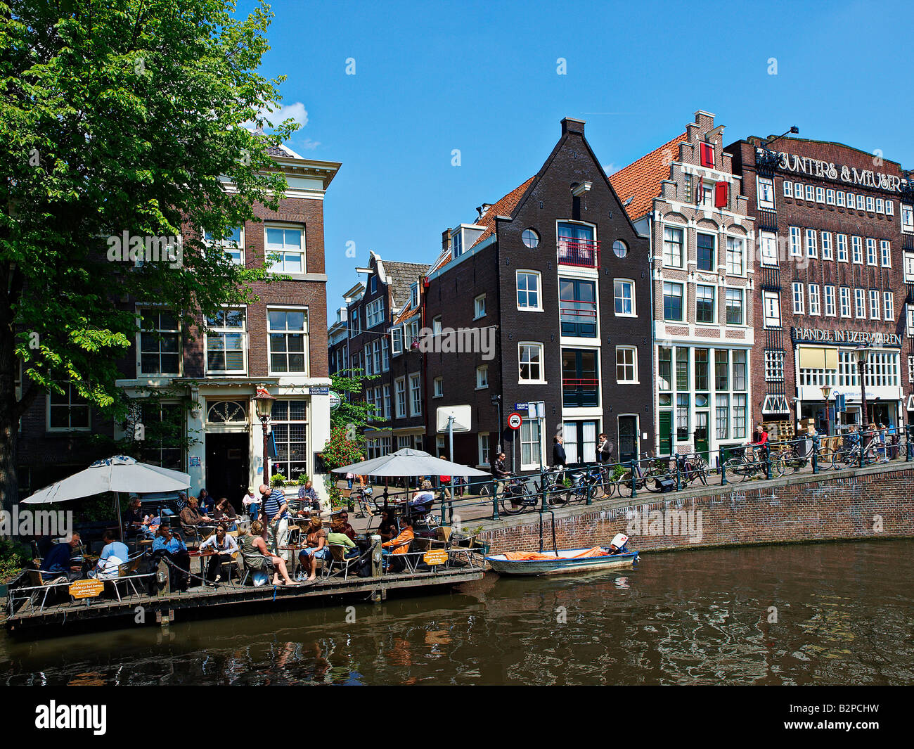 People drinking at an outdoor cafe, Amsterdam, Netherlands Stock Photo
