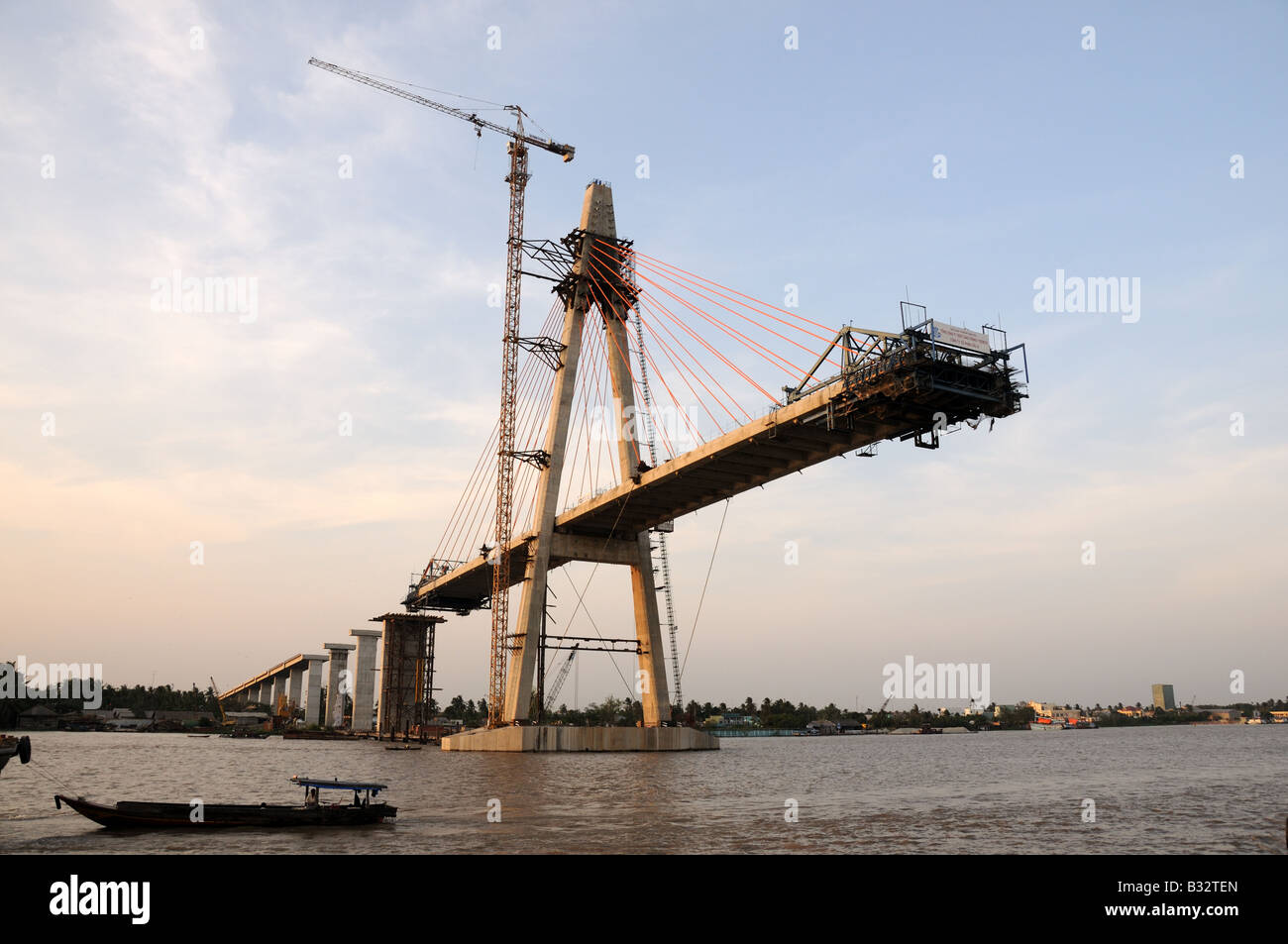 New Suspension bridge under construction across The Mekong River Stock