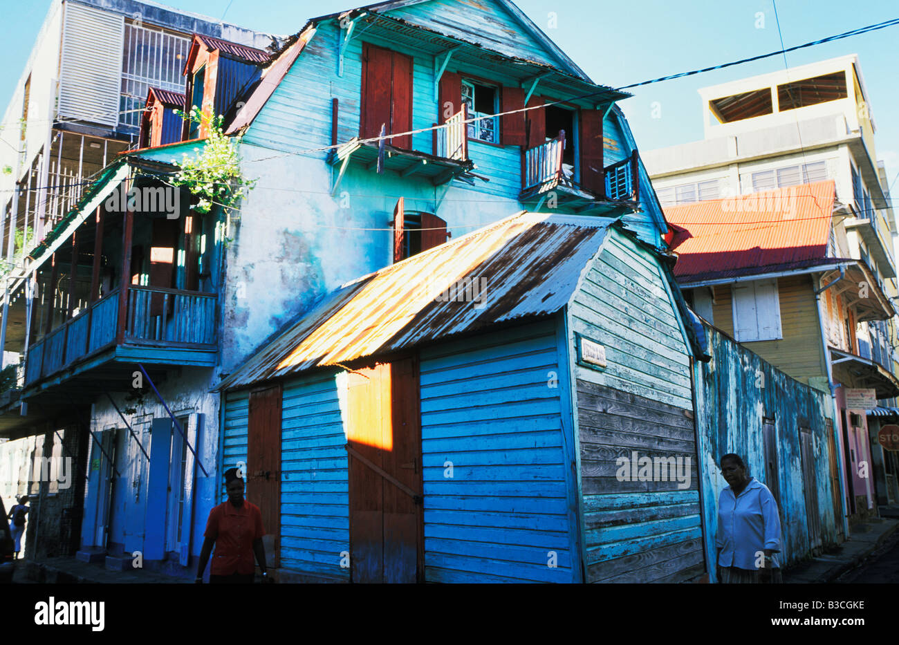 Street of Creole style buildings in downtown Roseau capital of Stock