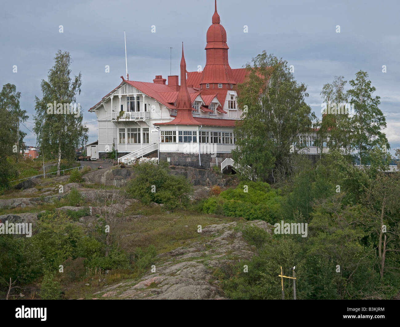 old-timber-wooden-villa-mansion-on-rocks