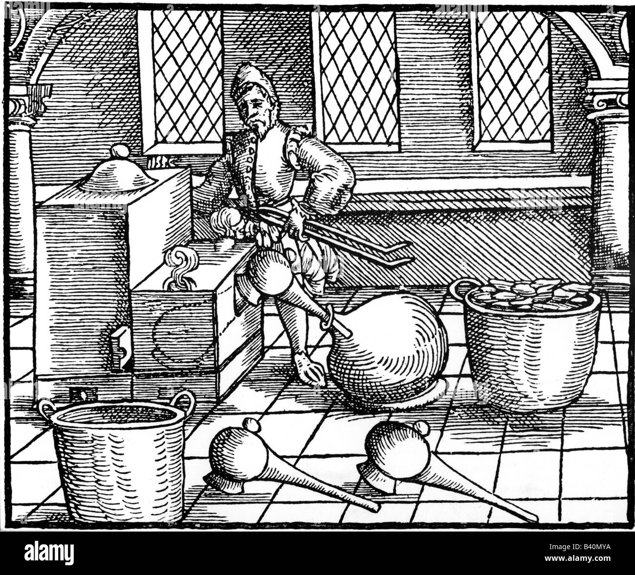 alchemy, distillation of nitric acid, woodcut, 15th century Stock Photo, Royalty Free Image
