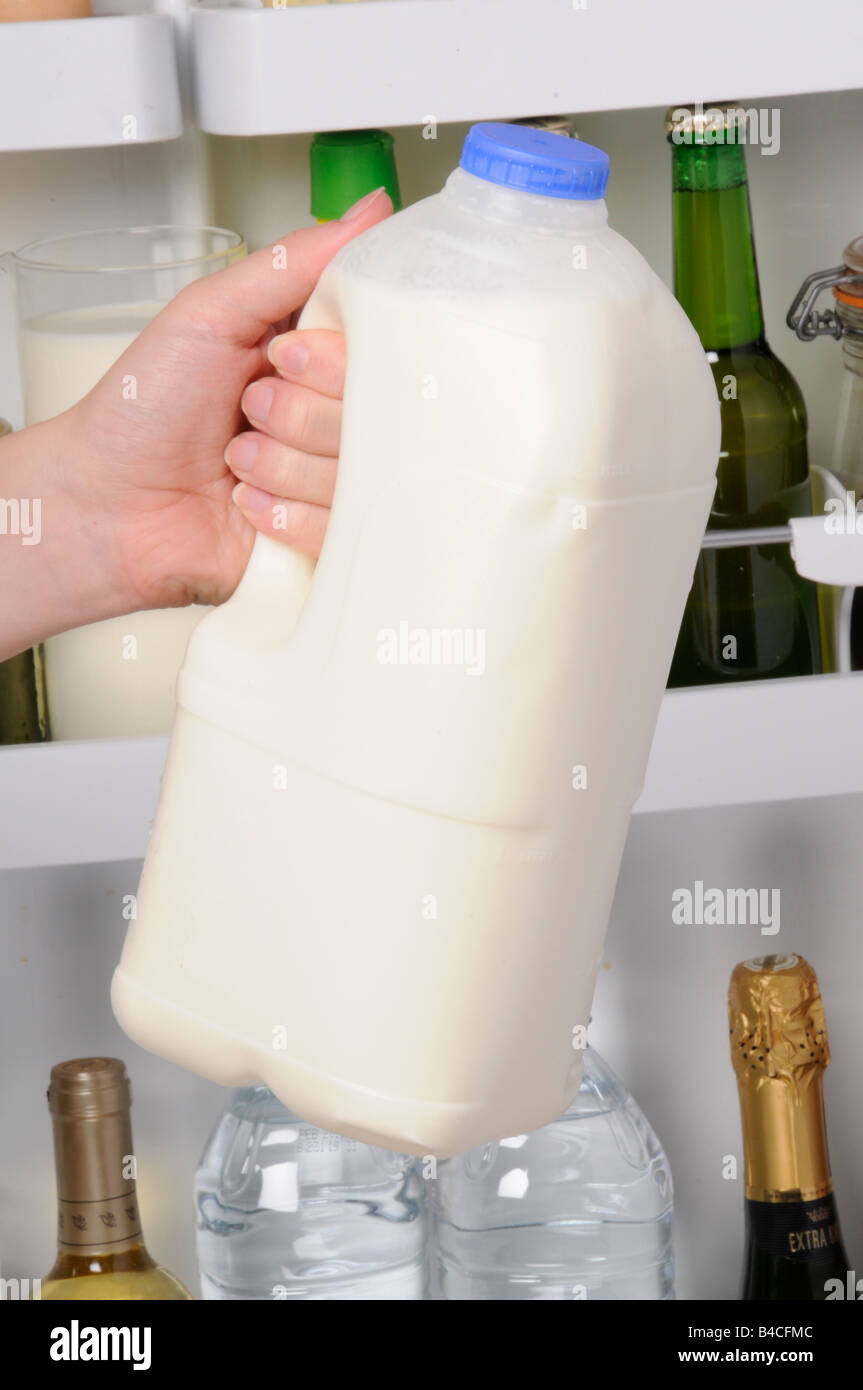 PUTTING PLASTIC MILK BOTTLE IN FRIDGE Stock Photo 19944748 Alamy