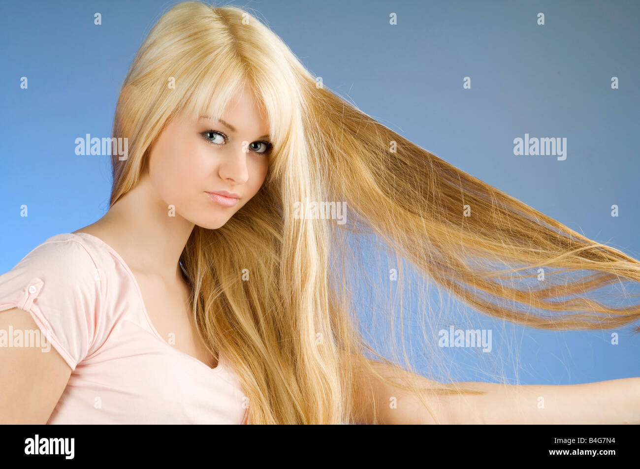 1. "Teenage girl with long blonde hair" - wide 2