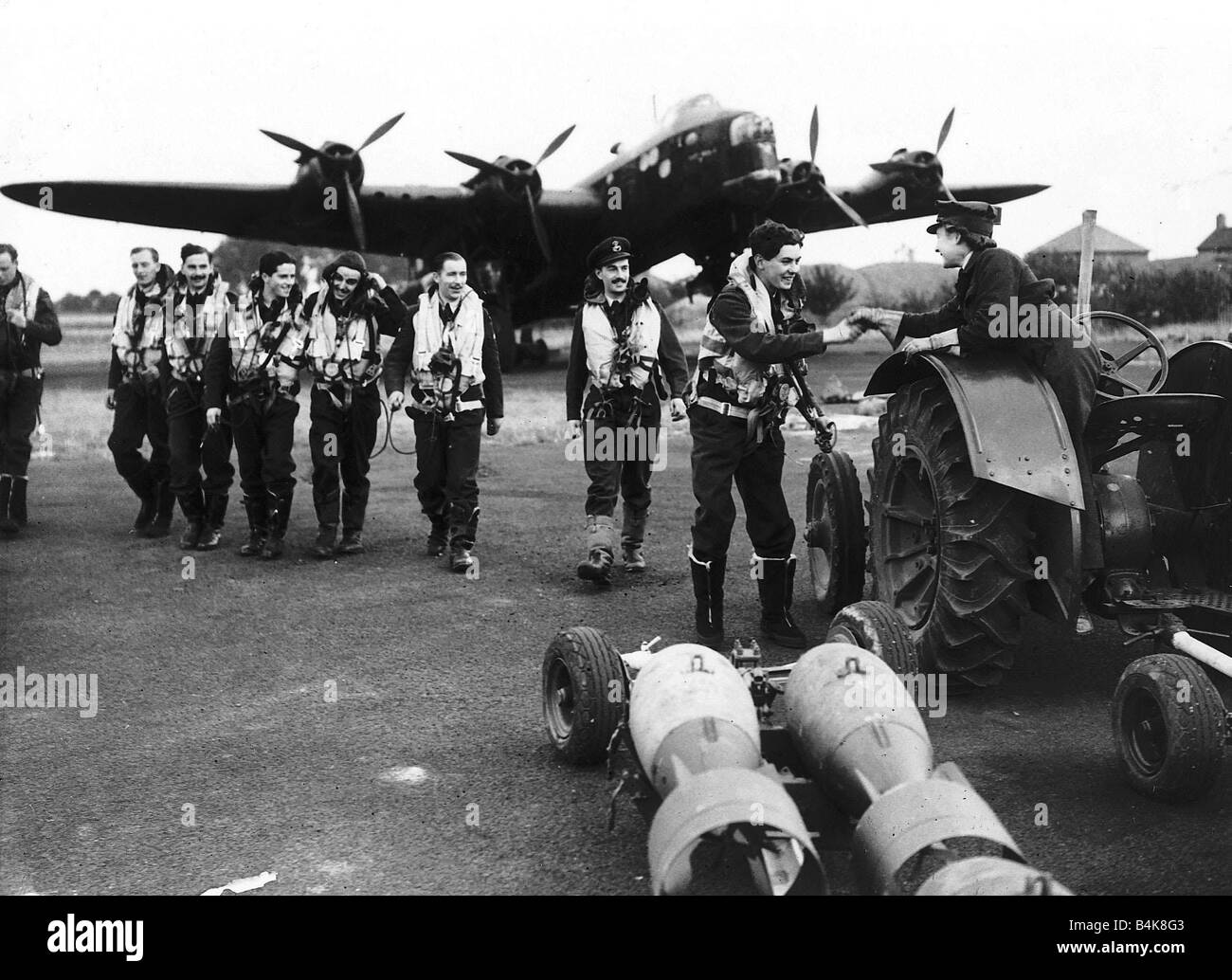 WW2 WAAF Women Auxiliary Air Force driver helping with the arming of