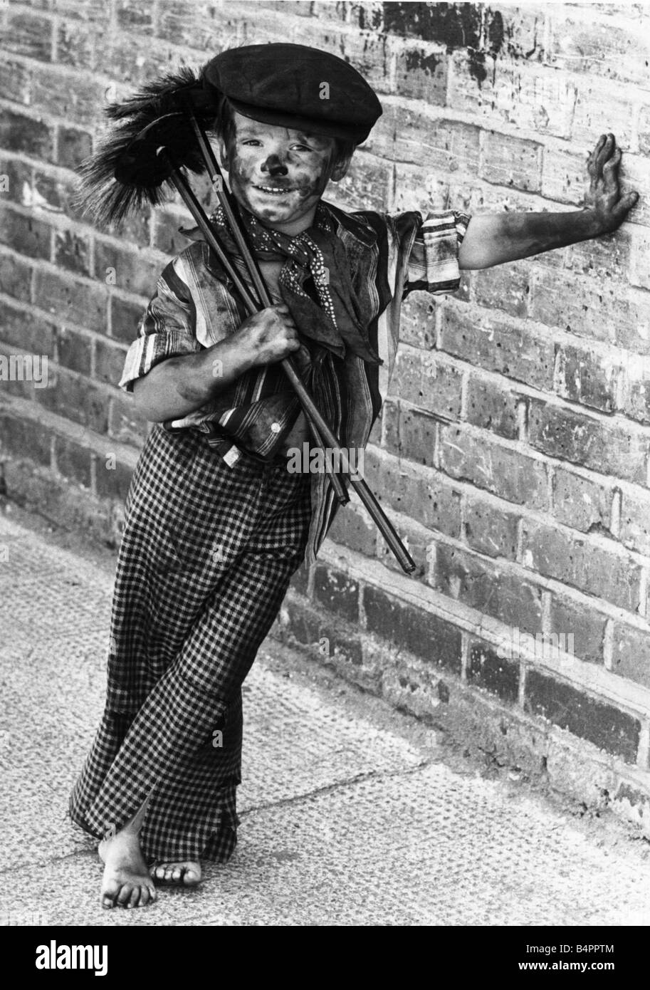 http://c8.alamy.com/comp/B4PPTM/four-year-old-chimney-sweep-tommy-stafford-in-fancy-dress-to-celebrate-B4PPTM.jpg