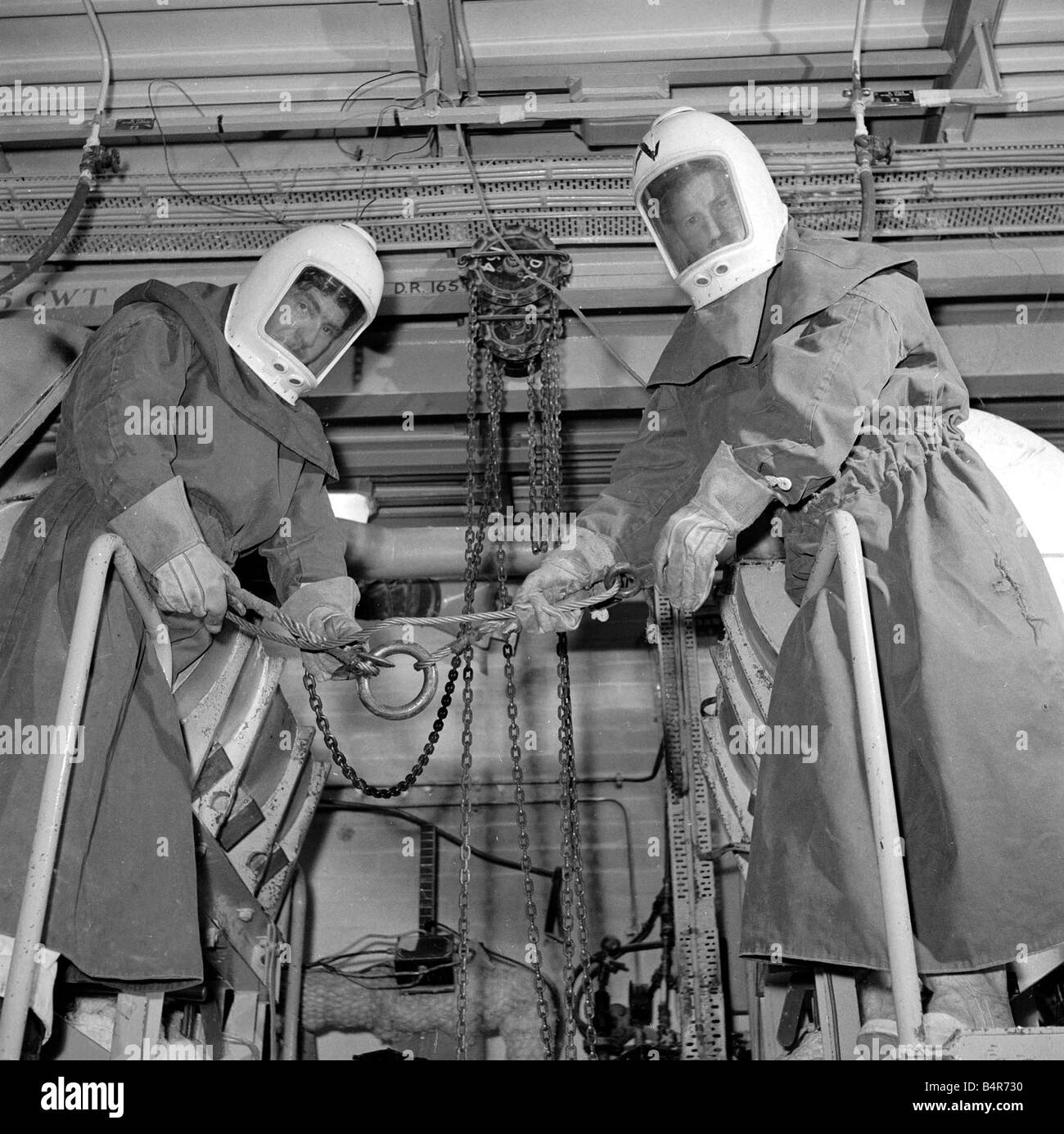 Workers wearing protective clothing at Dounreay Atomic Reactor near