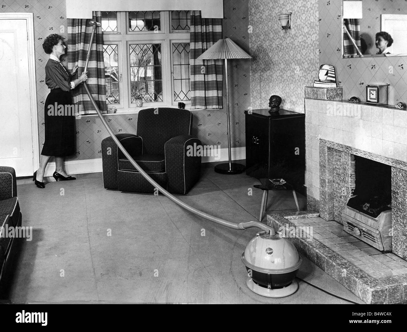 Living Room 1950s 1950s lounge living room september 1956 housewife cleaning Living Room 1950s 1950s lounge living room september 1956 housewife cleaning