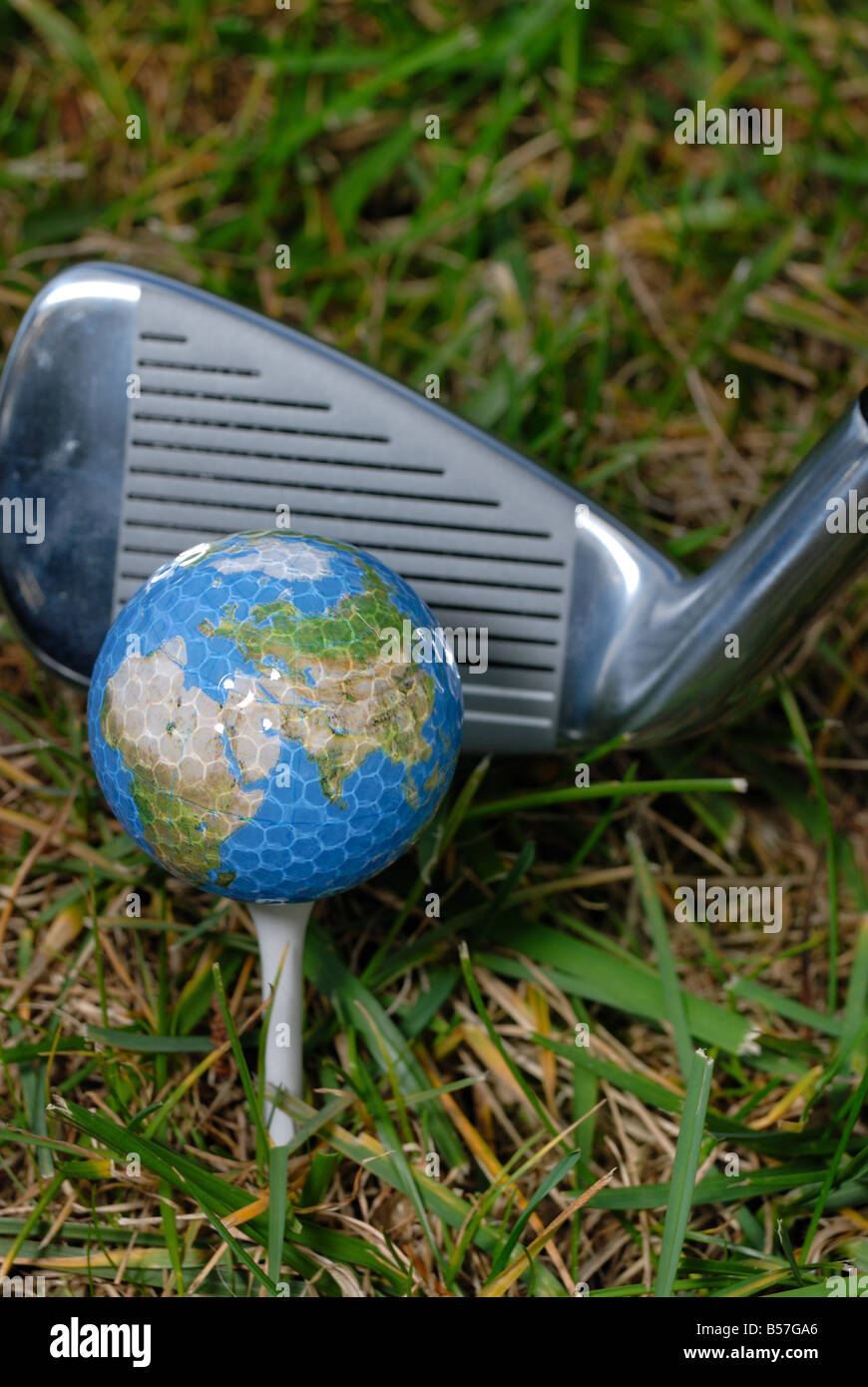 http://c8.alamy.com/comp/B57GA6/a-golf-ball-depicting-the-earth-sits-on-a-golf-tee-B57GA6.jpg