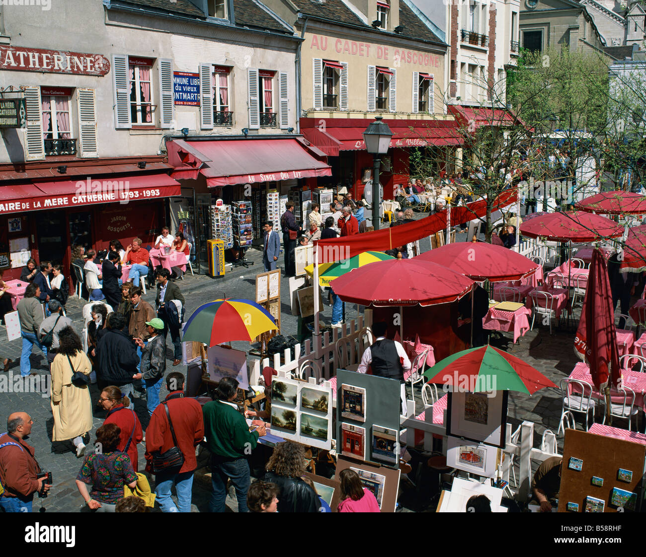 Market stalls and outdoor cafes in the Place du Tertre Montmartre Stock Photo, Royalty Free