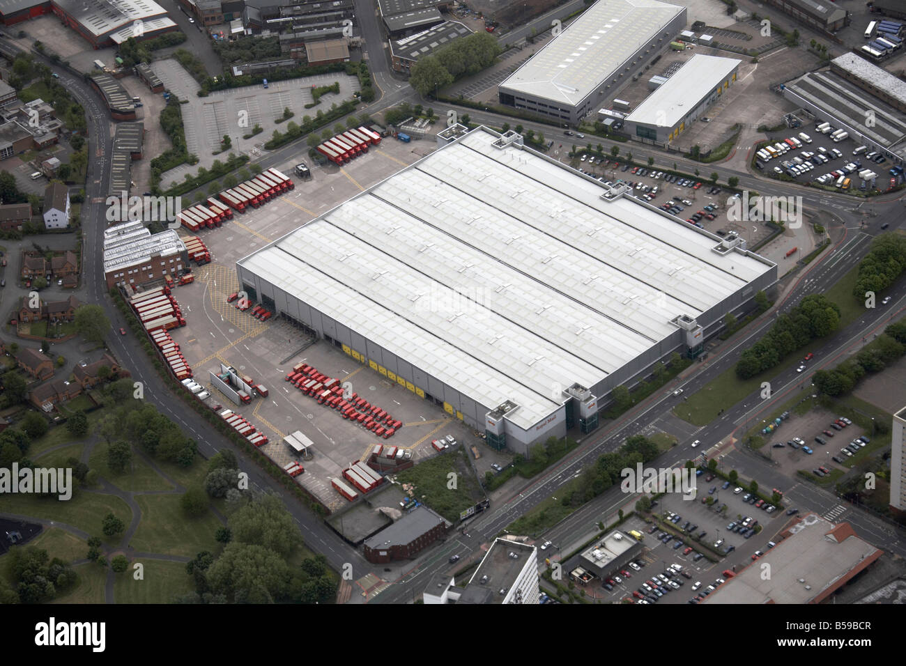 Aerial view south east of Royal Mail Depot lorries High Street Stock