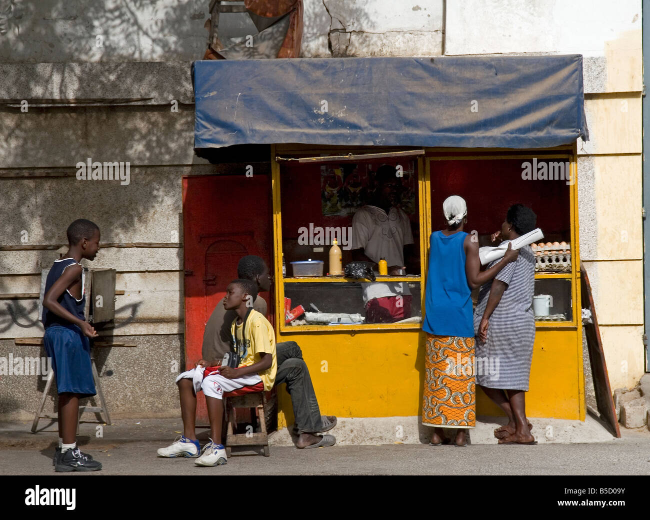 Snack stand selling local fast food Dakar Senegal Stock Photo, Royalty