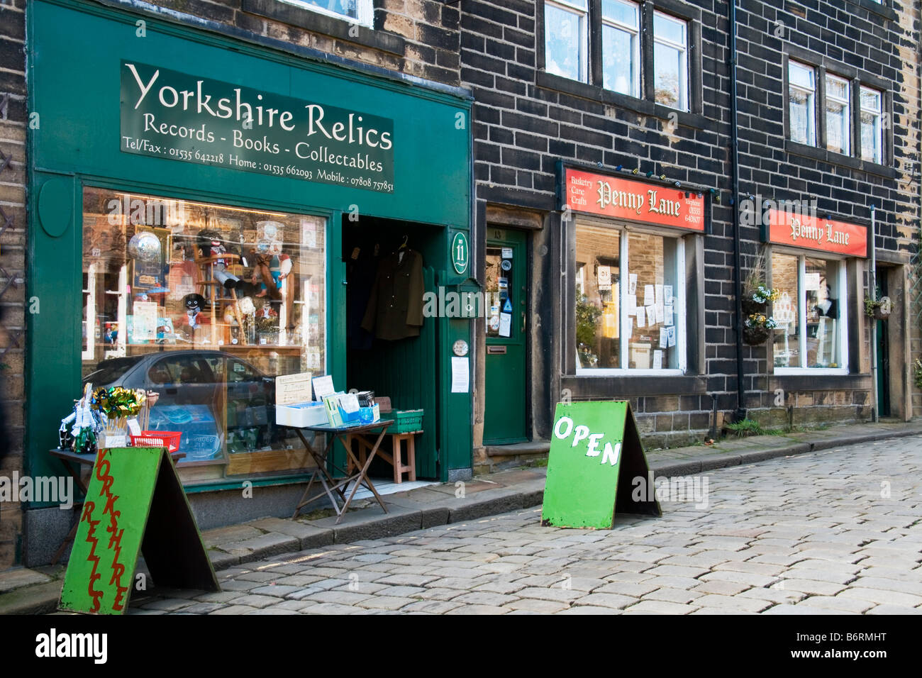 Village of Haworth in Yorkshire shops on the main street Stock Photo, Royalty Free Image