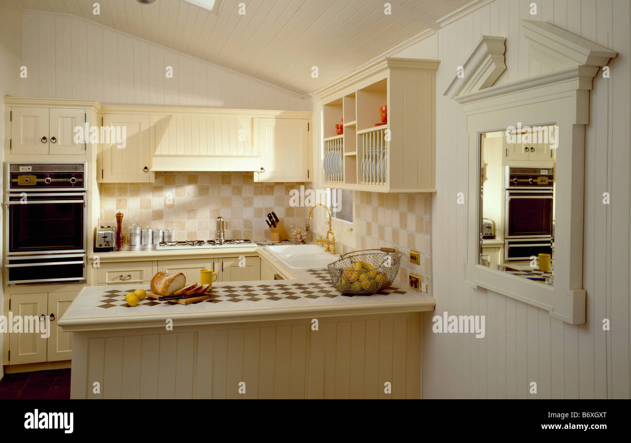 Kitchen Tiles For White Units white mirror on wall beside peninsular unit in white kitchen with Kitchen Tiles For White Units white mirror on wall beside peninsular unit in white kitchen with