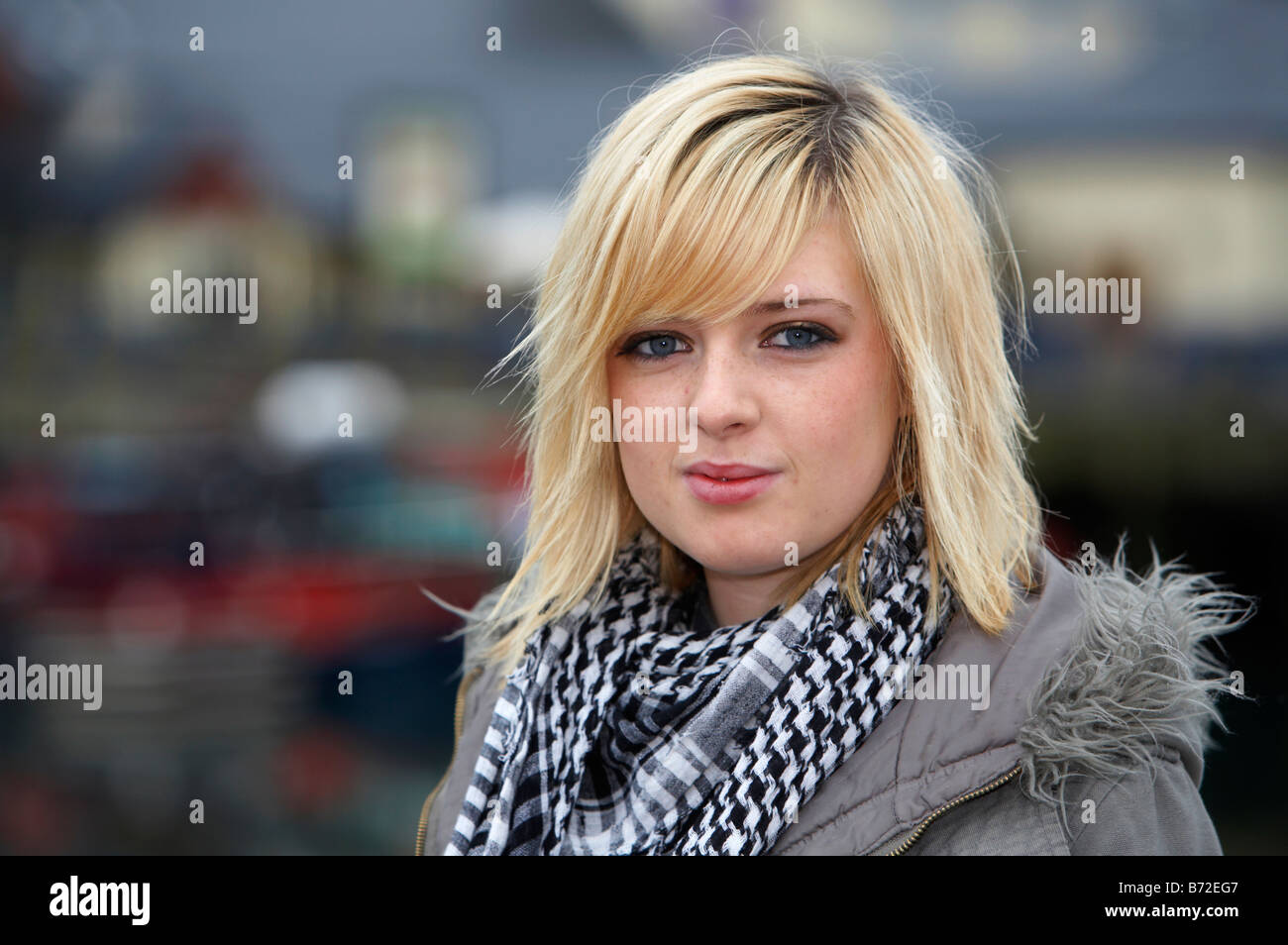 Blonde 18 Year Old Girl Wearing Jacket And Heavy Scarf Eye