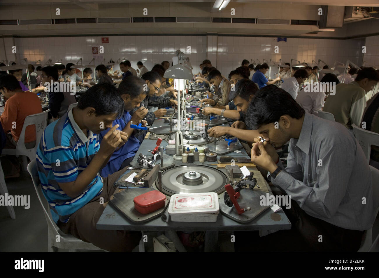 Workers in a diamond cutting in Surat City, Gujarat. India