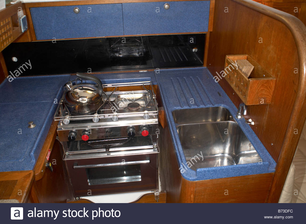 the interior of a contessa 32 yacht - the galley, or kitchen stock the interior of a contessa 32 yacht - the galley, or kitchen stock