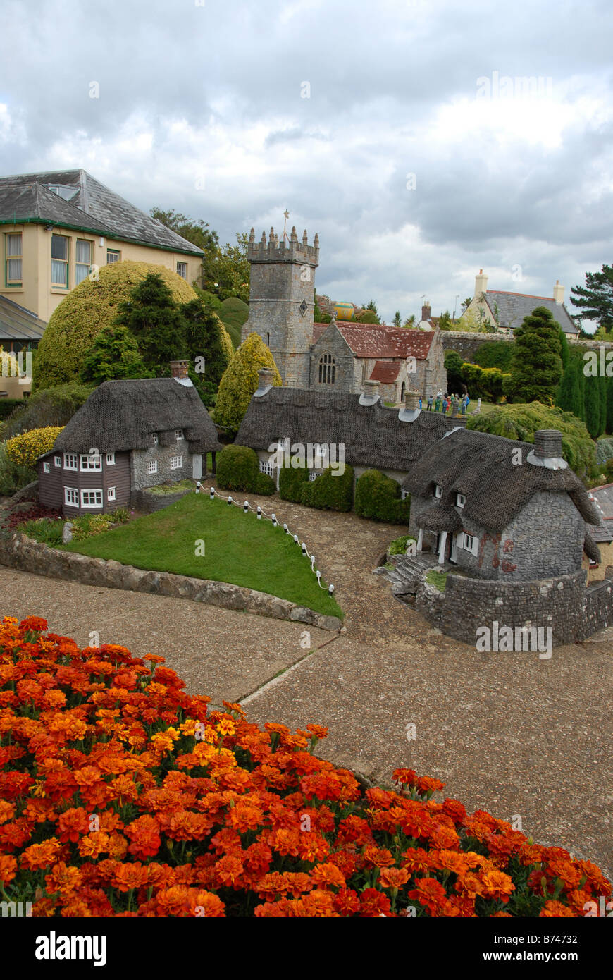 Visitors Admiring The Model Village Of Godshill At Godshill Village On