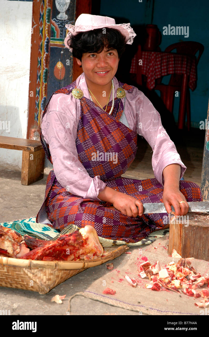 Female meat vendor at the market in Tongsa, Bhutan, Himalaya Stock