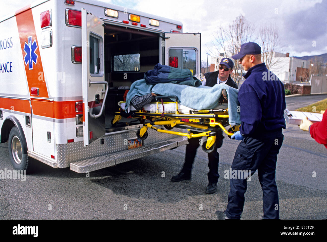 EMTs place car accident victim into ambulance Stock Photo, Royalty Free Image 21685823 Alamy